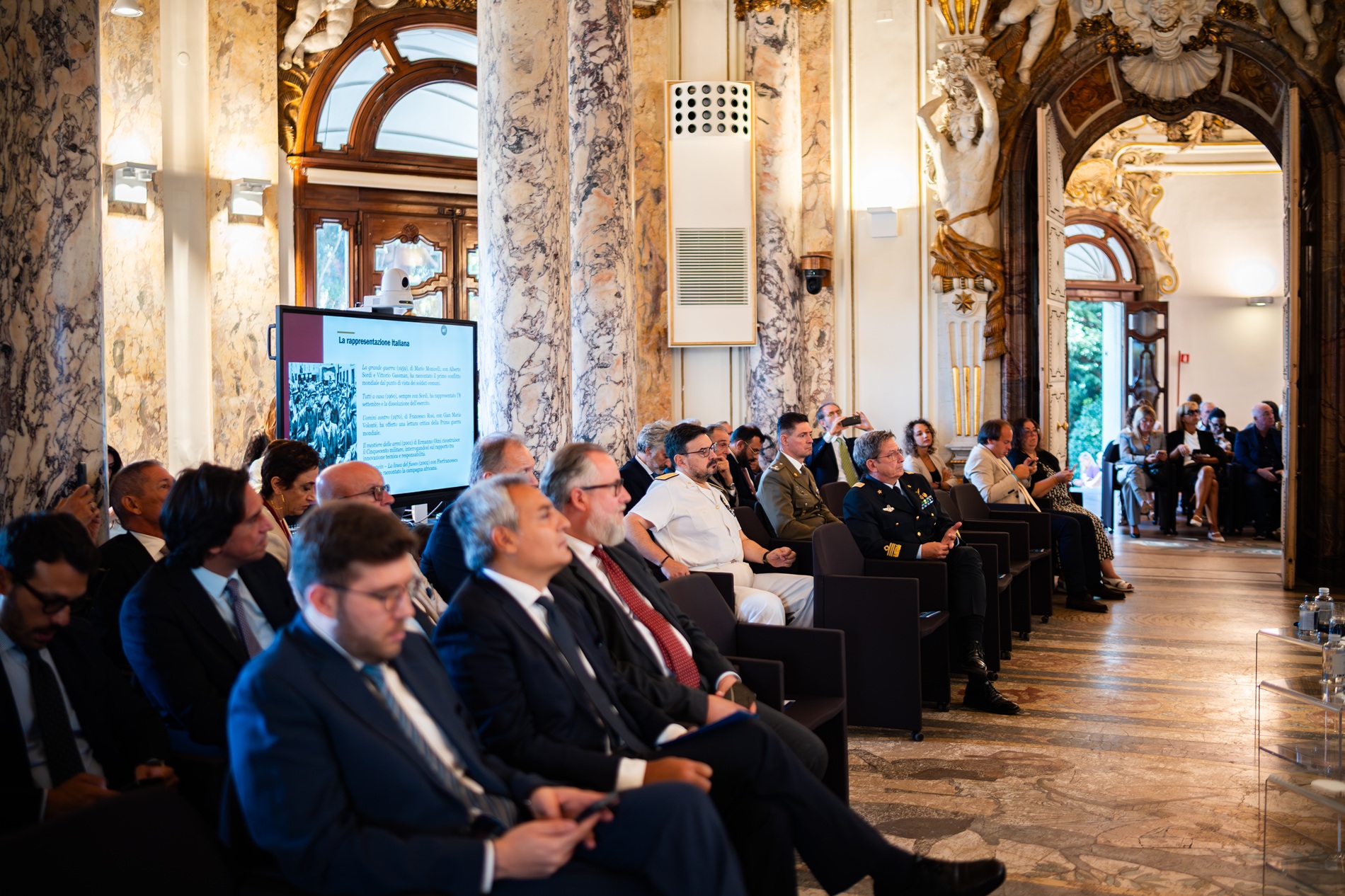 Pubblico durante una presentazione in sala